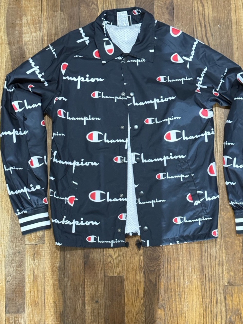 Champion Black Logo-Print Coach Jacket with Red Accents